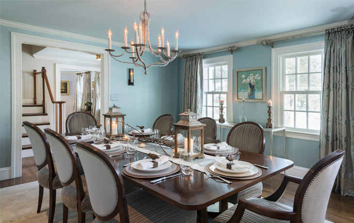 Soft blue tones combine with silver accents in a sophisticated dining room by Blue Jay Design of Wellesley, MA