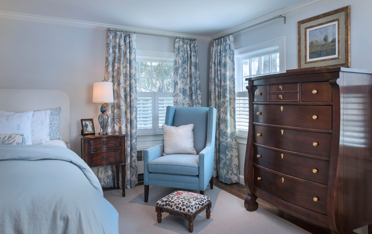 Blue and white color scheme in a master bedroom by Blue Jay Design of Wellesley, MA